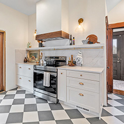 Kitchen with marble backsplash